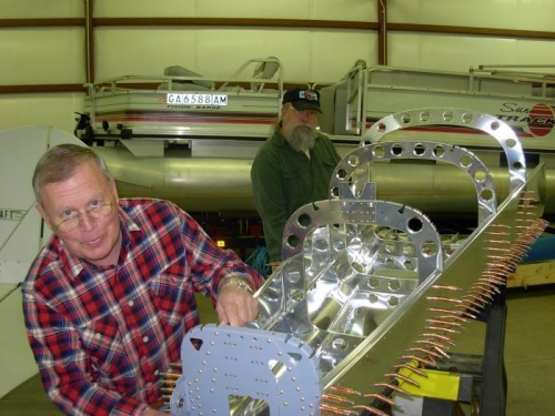 Attaching side skin to fuselage ribs