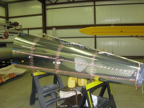 Side skins clecoed to fuselage ribs