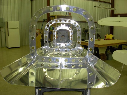 Bottom skin riveted to fuselage ribs