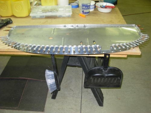 Drilled nut plates in top of firewall