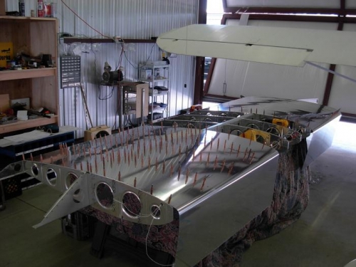 Inboard skin riveted. Outboard panel  clecoed.