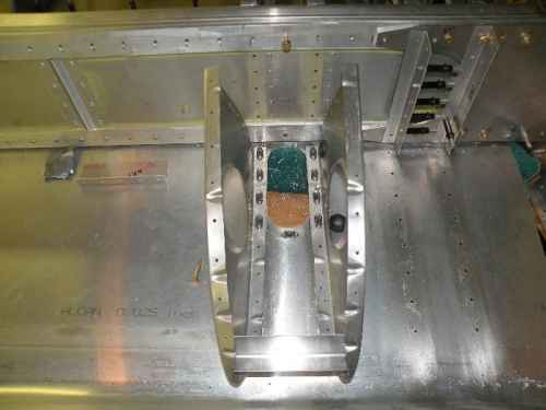 Trying to avoid removing flush rivets  in skin.  NR 2 is braced but not installed in this photo.