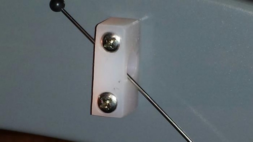 Elt antenna hold down
