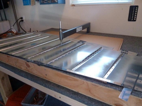 Rudder skin waiting for riveting.