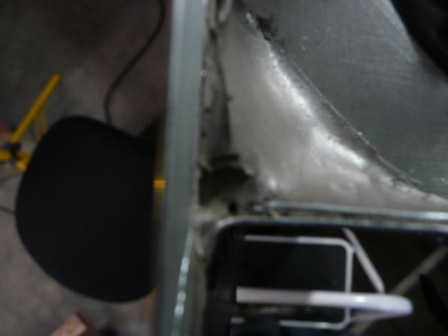 Top corner proseal with many holes in sealer