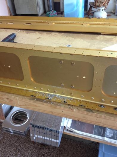 Tie down plate bolted for drilling