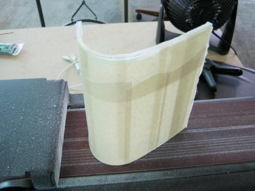 Sanded plexi edges smooth on belt sander