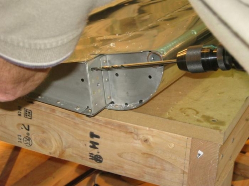 Drilling the holes in aileron spar for the hinges