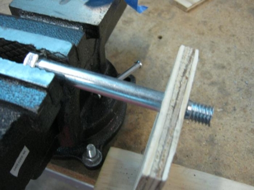 Bolt cut with sawzaw while supported with scrap