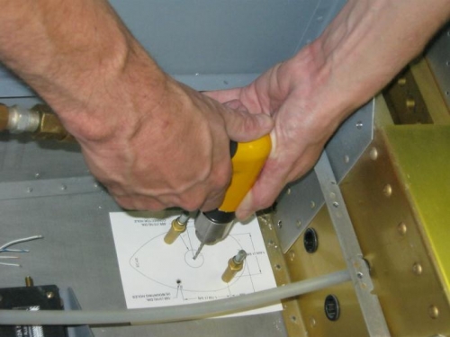 comm ant template in left side foot well area