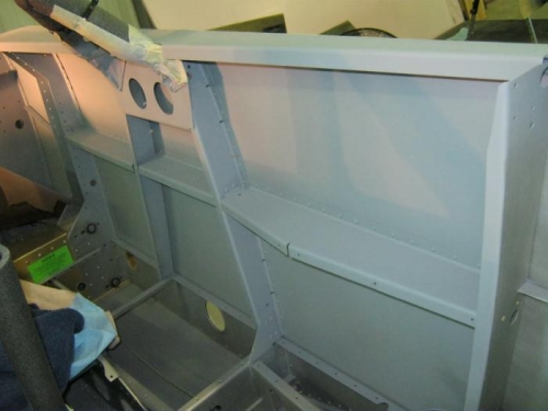 Gray primer on the cockpit side panels