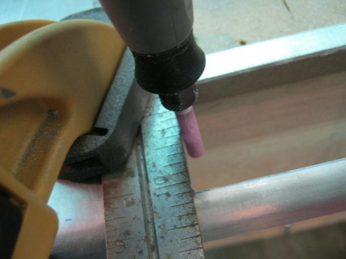 Using a rotary file to finish the cut dimensions