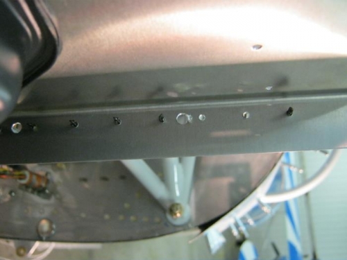 The rivit holes are meant to be closer to bend radius instead of centered on the flange