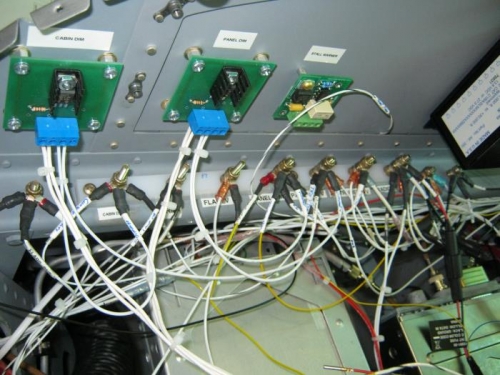 both dimmer modules wired and the mess of wire connections shown