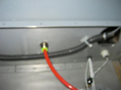 Pitot tube from ASI terminates at the bulkhead fitting in wing root area under left console