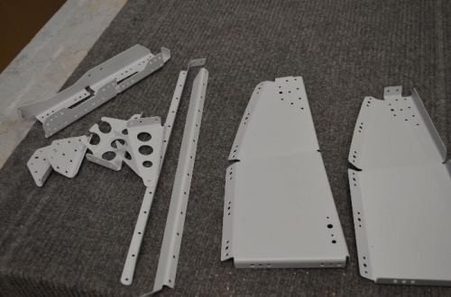 Several parts primed and ready for nutplates and assembly