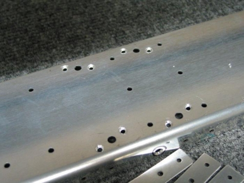 Countersunk holes for nut plates