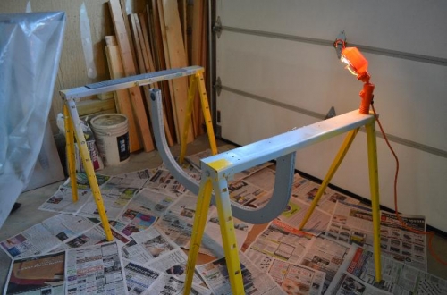 Roll bar inverted on painting stand
