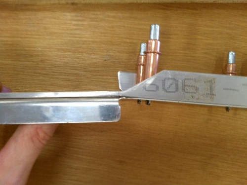 widened notch for cleaner mating of parts after bend