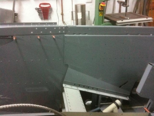 position of upper return flange??