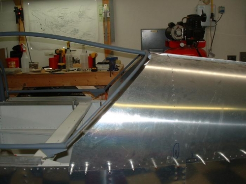 Second cut on the aft fuse skin.