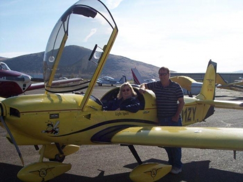 wife and I in school plane