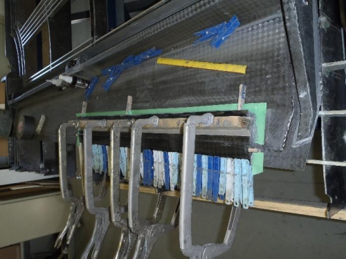 trim tab bonding, yes those are cloths pins holding the trailing edge