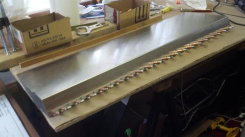 Rudder hinge aligned clecos installed