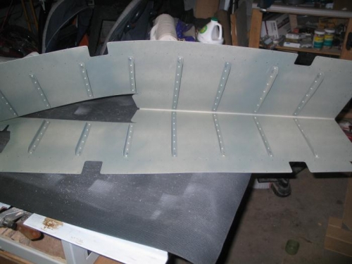 Stiffners riveted onto skin