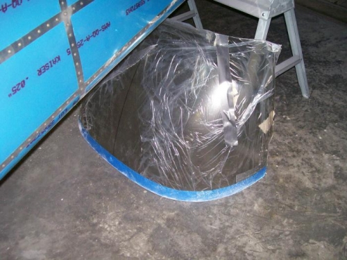Windscreen cut and stored in the floor