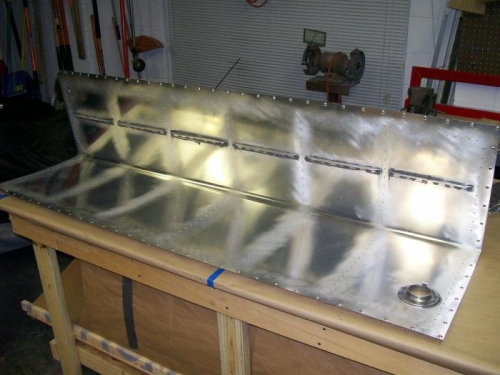 Stiffeners, drain fitting and fuel cap housing complete