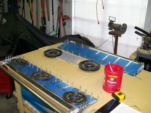 Ailerons assembled and trailing edge drilled to table