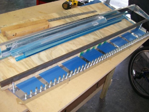 rudder is clecoed to the talbe after gluing