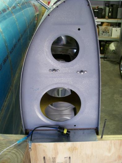 Nut plates in ribs and wiring harness