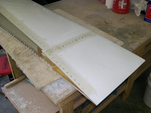 Finished riveting all the parts to the tip so added strips of fiberglass over the rivets