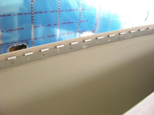 First side hinges riveted