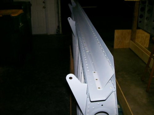 This picture shows the left wing with the aileron and flap gap fairing installed