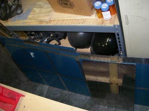 Top skin doubler on the floor against the outboard skin