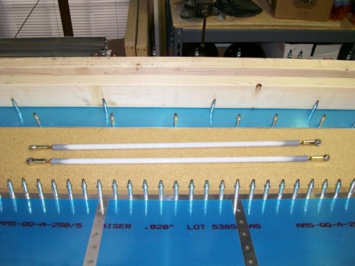 small pushrods that run from the bellcrank to the aileron