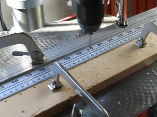 meter stick hinge rivet placement template