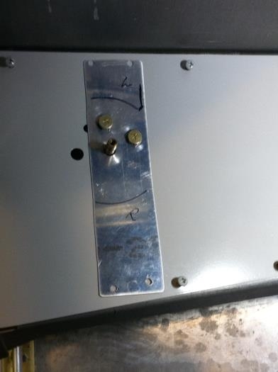 Used template to relocate holes for fuel valve in console cover
