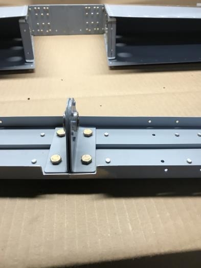 Elevator hinge bracket installed