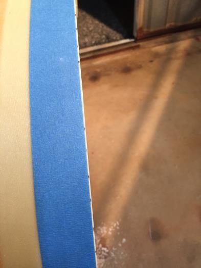 Blue tape marks the trim line