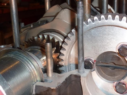 Cam gear and crank gear matched with dots ase seen