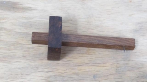 Marker gauge.  I'll replace the nail with a marker pen to make a good tool for marking rivet times.