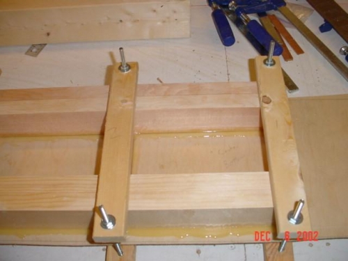 Clamps for bonding plywood to spar caps