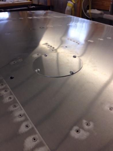 Flush rivets dressed and smooth