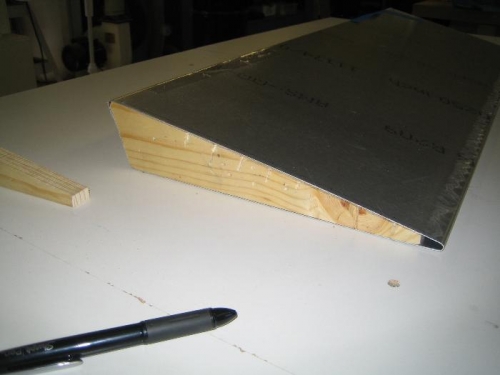 Cut elevator shown with wood support block