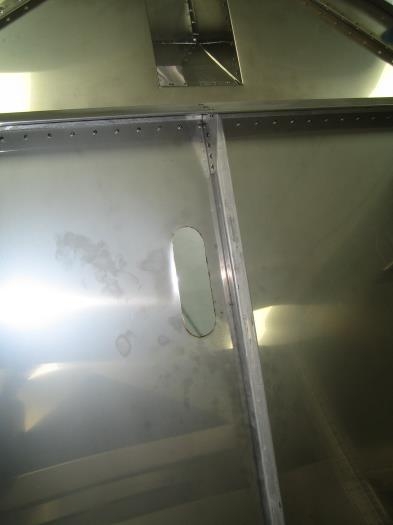 Nose gear push rod hole