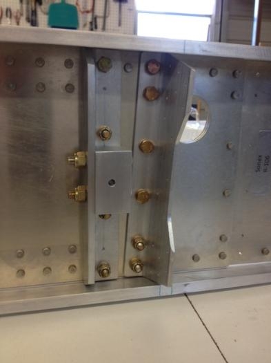 Inboard attach block and aft root rib attach angle